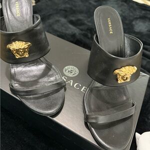 Versace Black Mules with Gold Medusa Accent